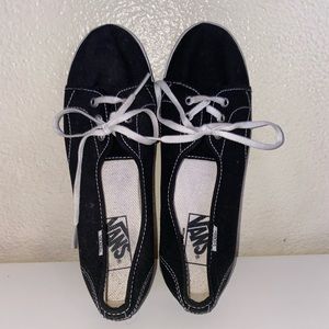 Low cut black vans